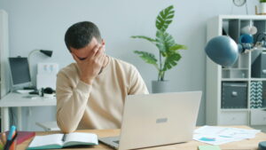 upset man at a desk